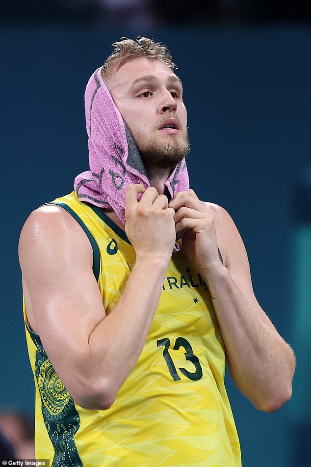 Team Australia's Jock Landale looks on after the match, putting them at risk of elimination