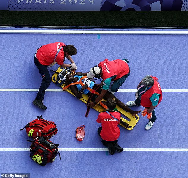 The South Sudanese star was then carried away on a stretcher after doctors treated her