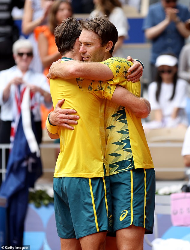 Team Australia celebrates match point during their Tennis Men's Doubles Gold Medal match against Austin Krajicek and Rajeev Ram of Team United States on day eight of the Paris 2024 Olympic Games