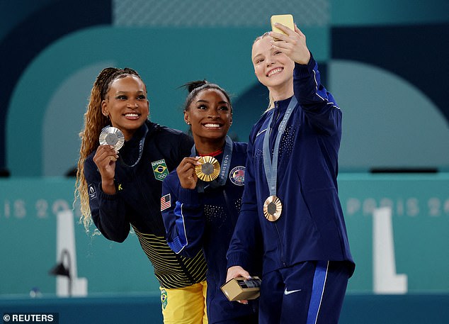 1722707689 258 Olympics fans laud Simone Biles for post vault moment with top