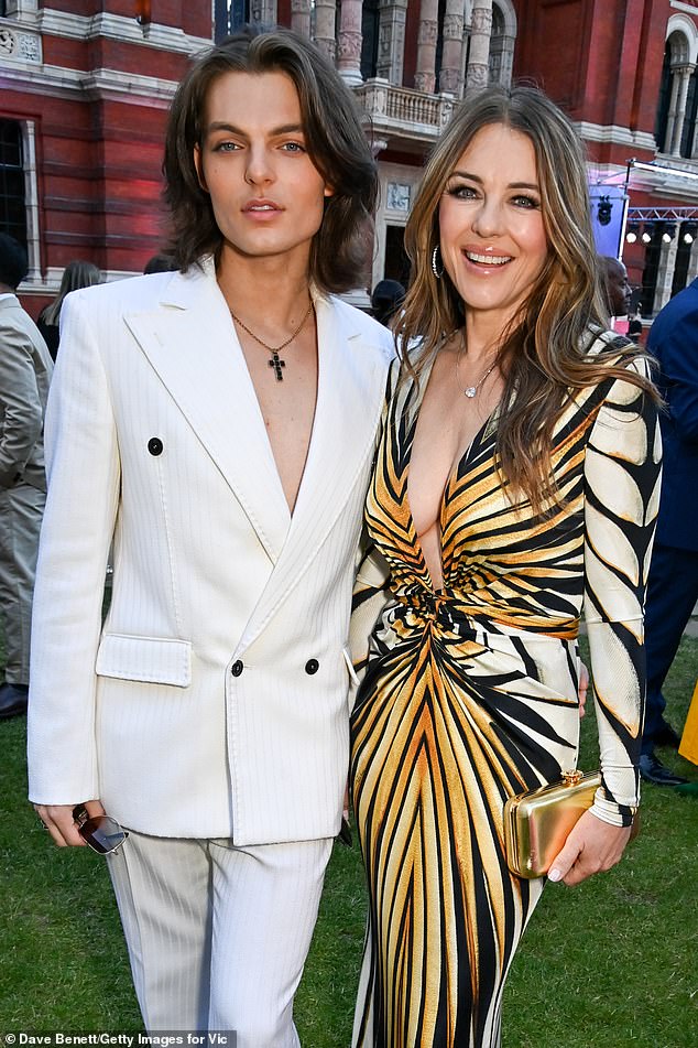 Liz Hurley and her son Damian (pictured together) only use their London apartment for romantic relationships, as they don't want to bump into each other's loved ones.