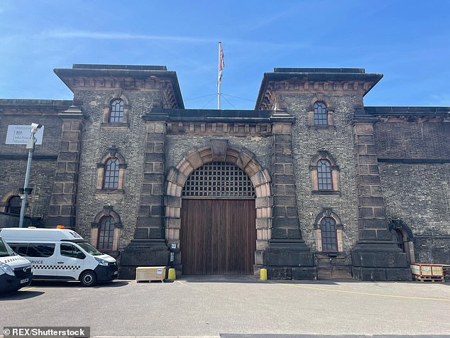 Pictured: The exterior of HMP Wandsworth in London