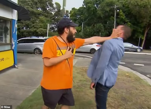 Jack Reuben is pictured physically assaulting A Current Affair presenter Steve Marshall in 2021