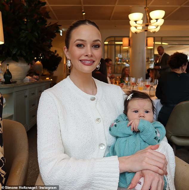 Despite the alleged estrangement, Simone (pictured with her and Jono's daughter Gia) remains on good terms with Madeline and they recently went out for lunch together