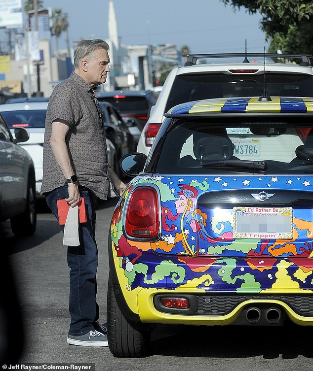 The comedian drove home alone in a flashy Mini Cooper, which was equipped with a license plate that read: 'I'd rather be tripping'