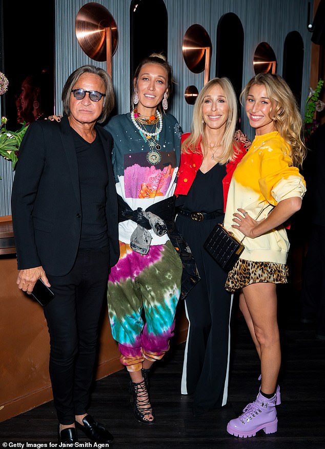 Alana is pictured with father Mohamed Hadid (left), mother Mary Butler and her sister Marielle (far right) in 2019