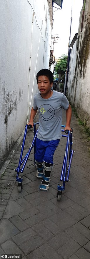 Jonathan, 14, (pictured) was recently cared for by his grandparents in Indonesia, but the family suffered a huge blow when his grandfather died