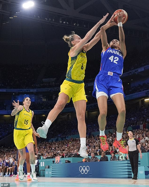 Steph Talbot is pictured blocking a shot from France's Leila Lacan during the victory