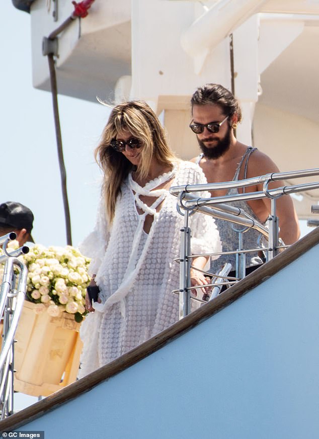 Though the couple officially tied the knot on February 22, 2019, they had a lavish wedding ceremony in Capri, Italy on August 3 of that year; the lovebirds can be seen aboard a swanky yacht on their wedding day off the coast of Italy.