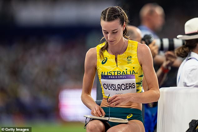 Australian Nicola Olyslagers angrily took notes on her own performance between jumps