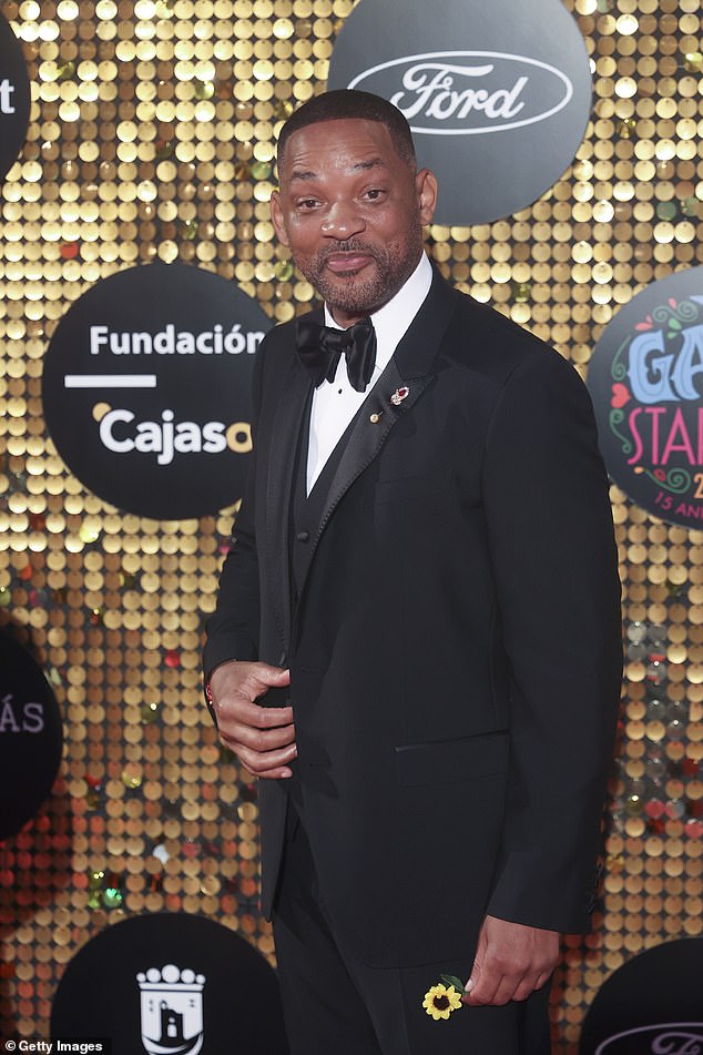 He wore a classic black satin bow tie and added some polish to his look with patent leather shoes, while sporting a close-cropped beard.