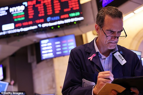 NEW YORK, NEW YORK - AUGUST 2: Traders work on the floor of the New York Stock Exchange during afternoon trading on August 2, 2024 in New York City. Stocks closed low after the July jobs report showed a slowdown in the labor market, with the Dow Jones closing down more than 600 points after falling nearly 1,000 points and the Nasdaq closing down more than 400 points. (Photo by Michael M. Santiago/Getty Images)