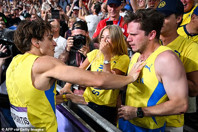 The pole vault champion then celebrated his achievement exuberantly with one of his Swedish teammates in Paris