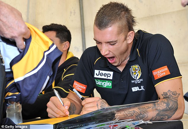 Martin is pictured signing autographs in 2014. Ten years later, he is freed after closing the door on his stellar playing career.