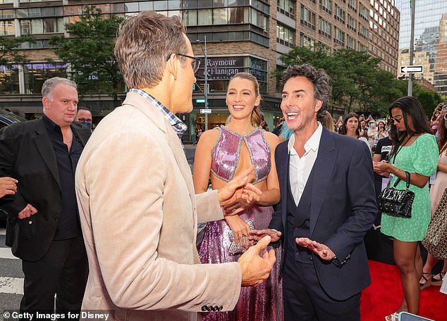 In an interview published by Variety on Monday that focused on the making of Deadpool & Wolverine, the film's director Shawn Levy admitted that he accepted the responsibility of being Olin's godfather; pictured with Ryan and Blake in NYC in 2021