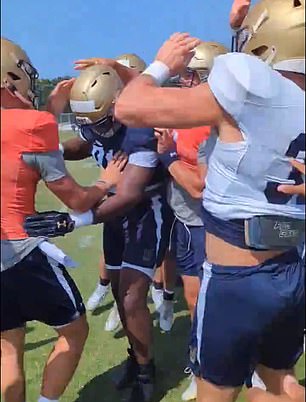 Navy football player is being harassed by his teammates