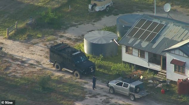 A barricade of logs and metal was placed in the driveway, about 100 yards from the house, causing the heavily armed BearCat police vehicle to come to a stop, which then came under fire