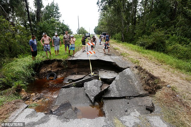 A 15-foot stretch of road in southern Hillsborough County, near Tampa, completely collapsed as a dormant sinkhole was ripped open by rushing water