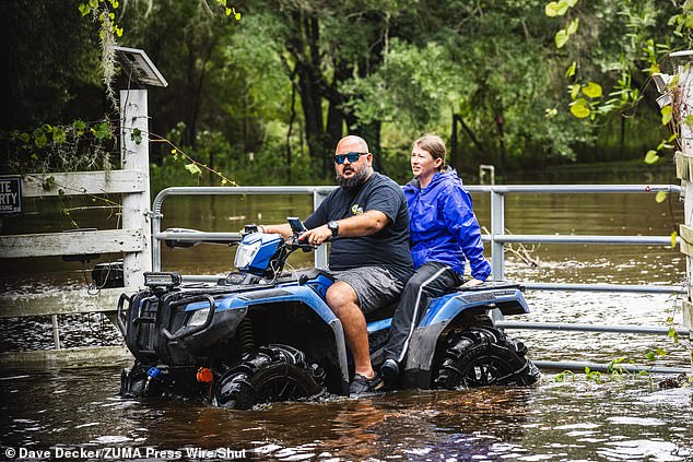 Meanwhile, this family decided to take their ATV for a spin, testing it out on the now completely flooded streets of eastern Hillsborough County