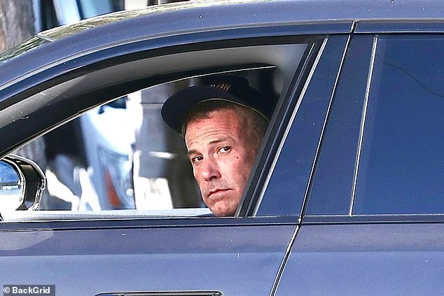 The 51-year-old Hollywood actor was hard at work as he drove from his office to the set of one of his latest films