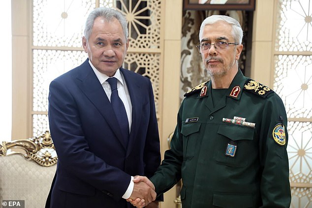 Iranian Chief of Staff of the Iranian Armed Forces General Mohammad Bagheri (R) meets with Russian Security Council Secretary Sergei Shoigu (L) in Tehran, Iran