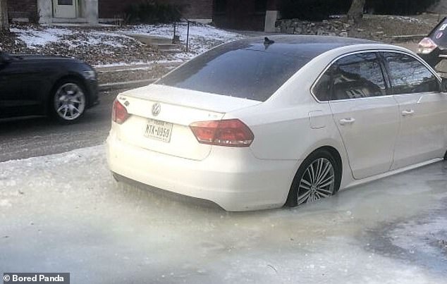 A man in the US was left furious after his car got stuck in a huge block of ice after floodwaters froze over, leaving him unable to even travel to work