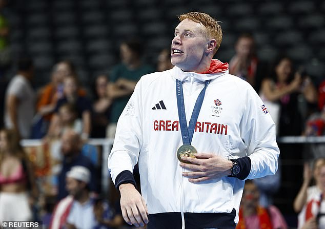 The 24-year-old swimmer, who won a gold medal at the Olympics, appeared on the Capital Breakfast on Tuesday after his team finished first in the freestyle relay at the Summer Olympics (pictured July 2024)