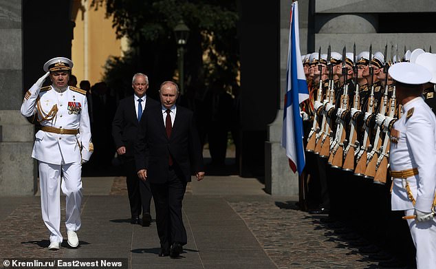 A suspected assassination plot against Vladimir Putin by Ukraine was stopped after Russia's defense minister called his counterpart in the Pentagon, Moscow said. Pictured: Russian President Vladimir Putin, Defense Minister Andrei Belousov during the annual Navy Day parade on July 28, 2024 in St. Petersburg, Russia