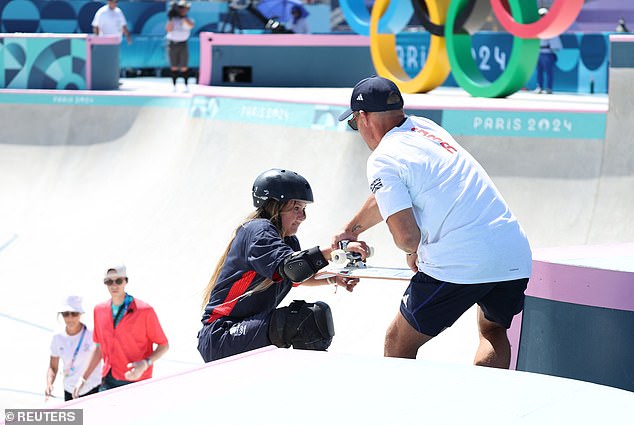 She was helped to the top of the course after her run, ahead of the final later today