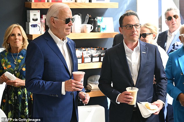 U.S. President Joe Biden, First Lady Jill Biden (L) and Pennsylvania Governor Josh Shapiro (R) visit a coffee shop in Harrisburg, Pennsylvania, on July 7, 2024