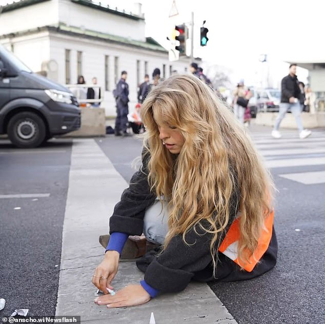 The image shows climate activist Anja Windl from Bavaria, Germany, who has become known as 'Climate Shakira'