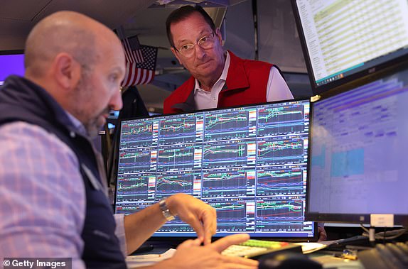 NEW YORK, NEW YORK - AUGUST 6: Traders work on the floor of the New York Stock Exchange during morning trading on August 6, 2024 in New York City. Stocks opened slightly across the three major indexes, a day after the Dow Jones and S&P 500 had their worst trading days since 2022 amid a global market sell-off centered on fears of a U.S. recession. (Photo by Michael M. Santiago/Getty Images)