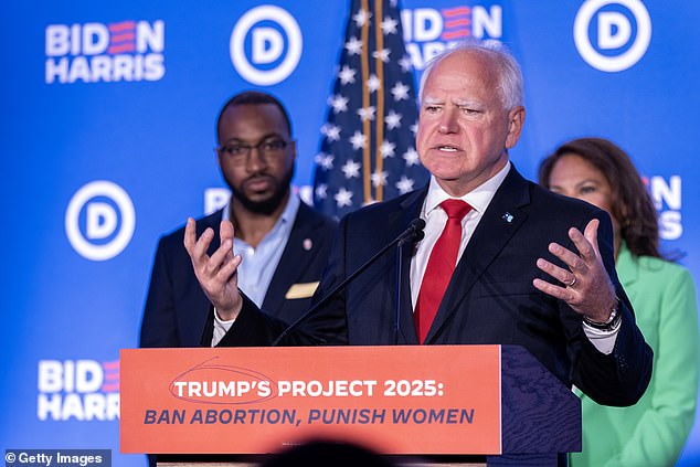 Minnesota Governor Tim Walz speaks at a Biden-Harris campaign event, criticizing former President Donald Trump