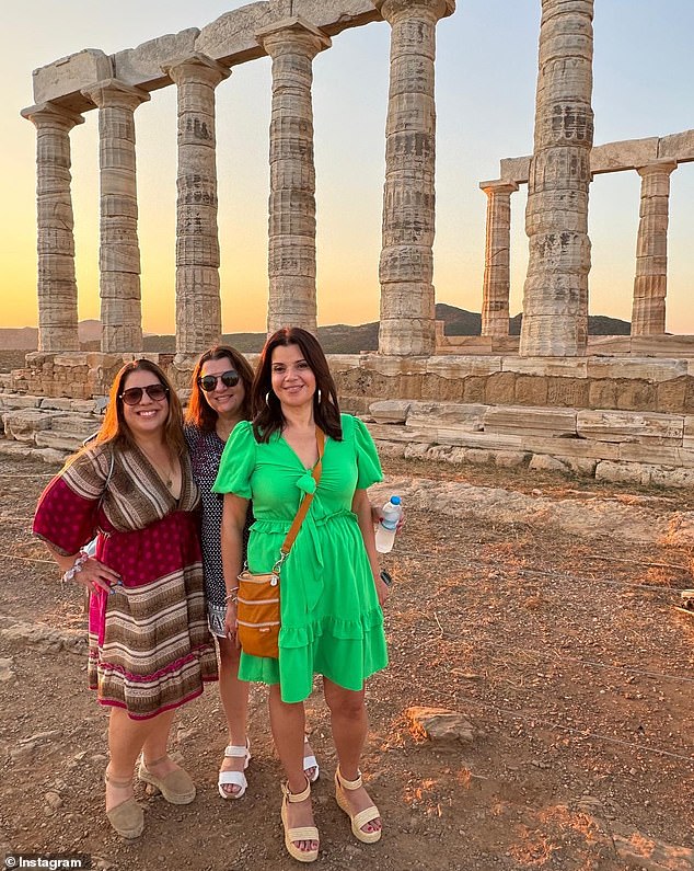 The 52-year-old looked sensational as she posed in front of the Temple of Poseidon with two of her girlfriends