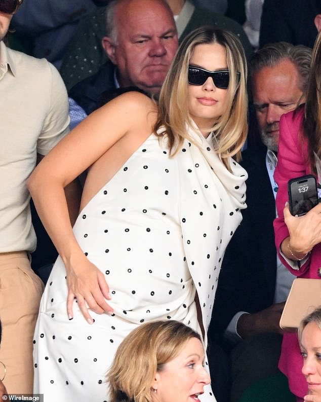 Robbie showed off her belly at Wimbledon last month