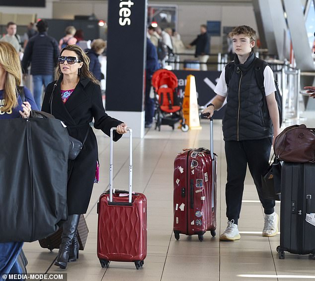 The Melbourne-born star looked relaxed and radiant as she enjoyed the company of her loved ones as they navigated the busy airport