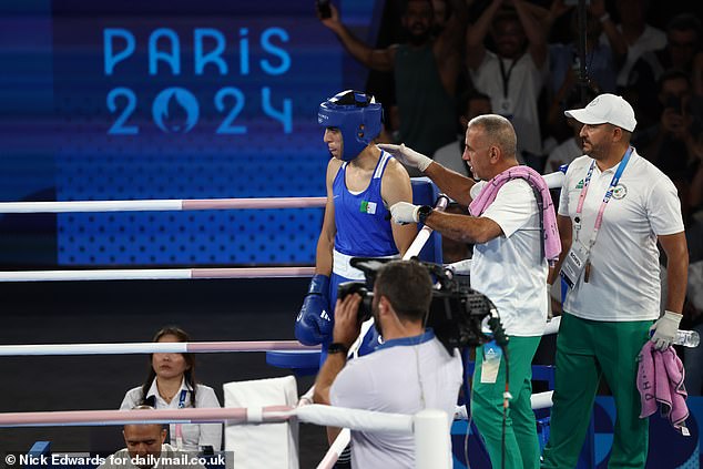 Algeria's Imane Khelif cools down during a fight with Thailand's Janjaem Suwannapheng in their women's 66kg boxing semi-final match