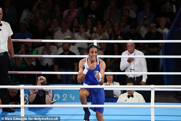 Algeria's Imane Khelif celebrates victory against Janjaem Suwannapheng