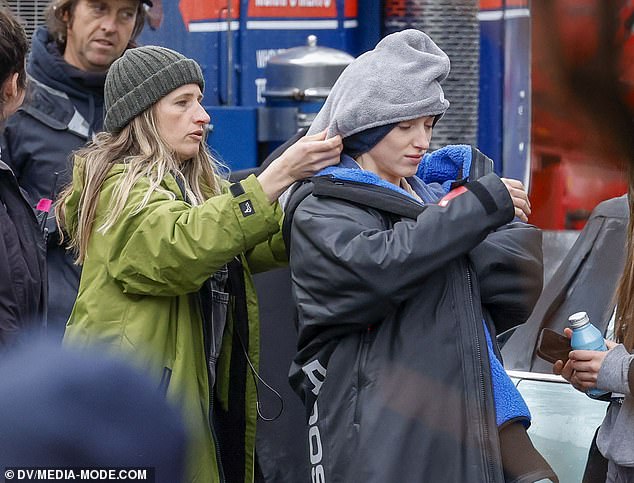 Phoebe, who plays Daphne Bridgerton in the steamy drama, hid her trademark auburn locks as she stepped out in Victoria's drizzly weather