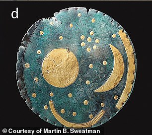 Pictured: The Nebra sky disk found in Germany, which contains symbols for the sun, moon, Pleiades and a possible comet