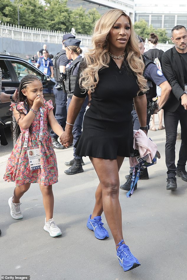 Williams competed in several sports at the Paris Olympics and is pictured with her daughter Olympia as they arrived for the women's artistic gymnastics team final last week.