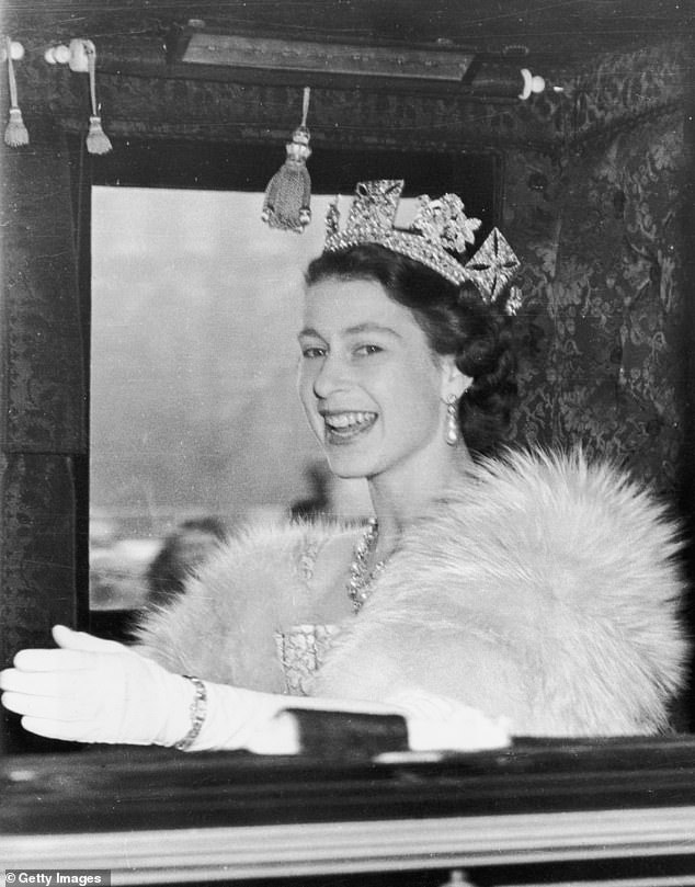 Queen Elizabeth II, wearing her State Diadem, on her way to Westminster to lead the first State Opening of Parliament since her accession to the throne in 1952.