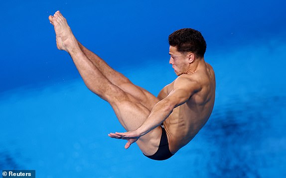 Paris 2024 Olympic Games - Diving - Men's 3m springboard semi-final - Aquatics Centre, Saint-Denis, France - August 7, 2024. Jordan Christopher Houlden of Great Britain in action. REUTERS/Hannah Mckay