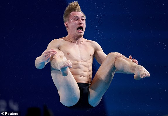 Paris 2024 Olympic Games - Diving - Men's 3m springboard preliminary round - Aquatics Centre, Saint-Denis, France - August 6, 2024. Jack Laugher of Great Britain in action. REUTERS/Leah Millis