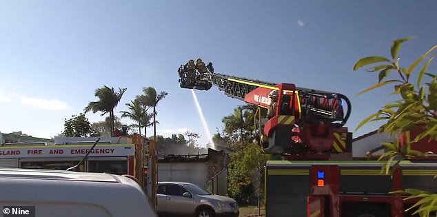 Three firefighters were sent to tackle the blaze (pictured), which caused the roof to collapse, while Mrs Udenzi was found inside and rescued by a firefighter