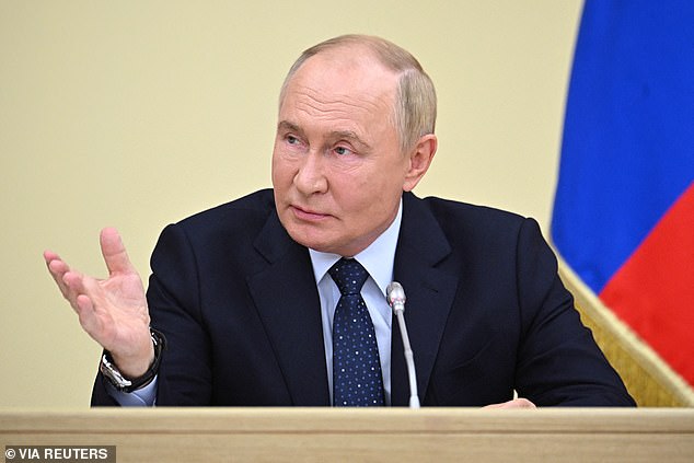 President Vladimir Putin pictured during his meeting with ministers at the Novo-Ogaryovo state residence in Moscow