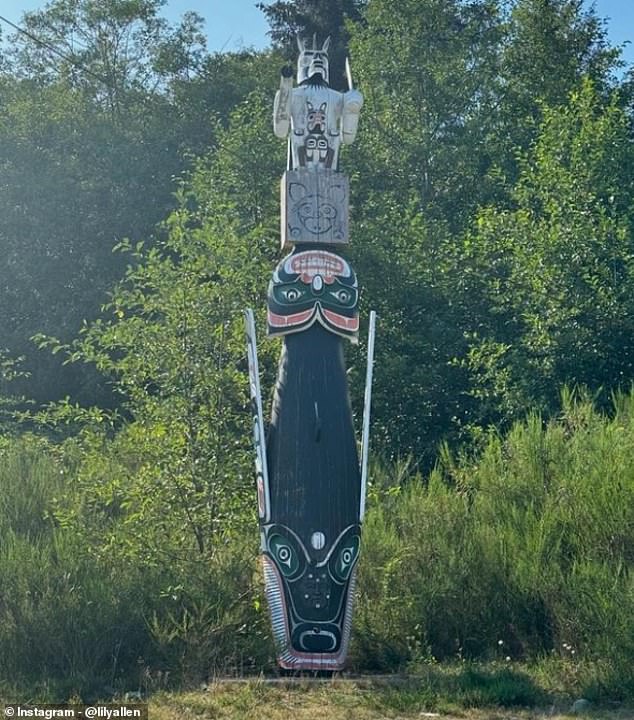 In another photo, shared as part of her Instagram dump, the singer posed in front of a harbor with small boats and clear blue water before showing off some artwork by indigenous Canadians