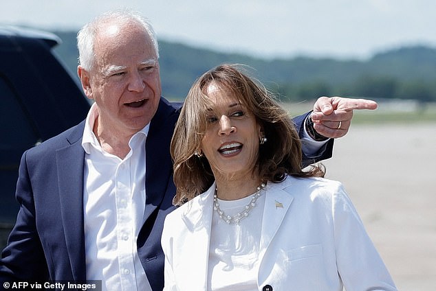 U.S. Vice President and 2024 Democratic presidential candidate Kamala Harris (R) and her running mate, Minnesota Governor Tim Walz, arrive at Chippewa Valley Regional Airport in Eau Claire, Wisconsin, August 7, 2024. Harris and Walz speak at a campaign rally in Eau Claire on Wednesday