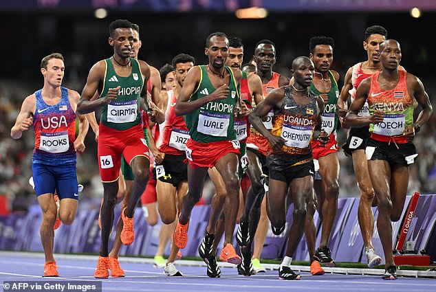 Girma (second from left) before his worrying fall in the peloton of the 3000m steeplechase