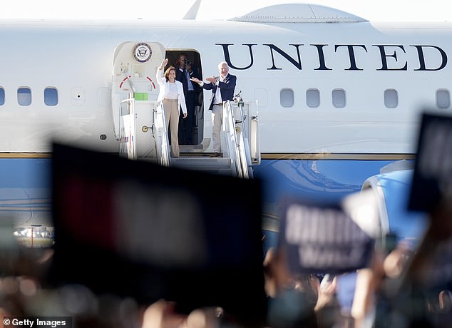 Kamala Harris and Tim Walz step out of Air Force Two